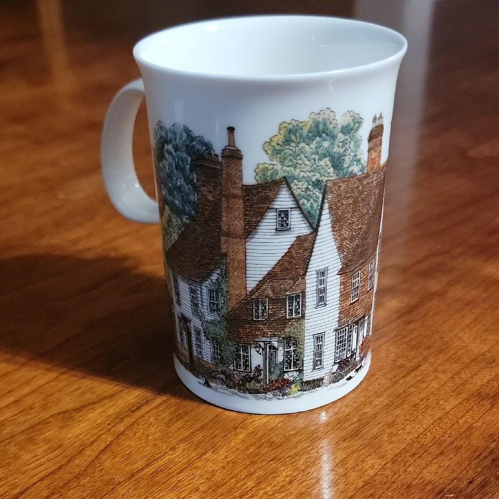Charming Brown and Green Ceramic Mug with Village Scene